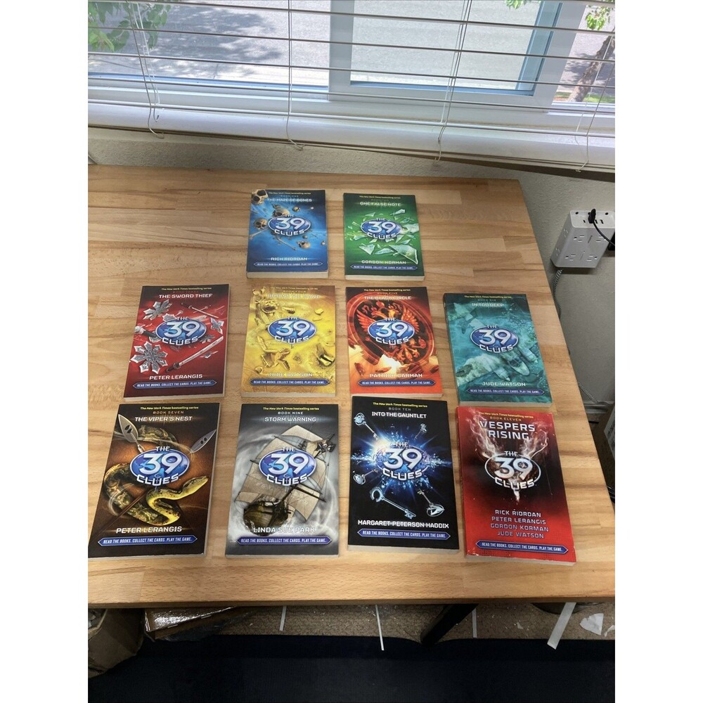 A lot of 10 books of the 39 clues by Rick Riordan #s 1-7, 9-11